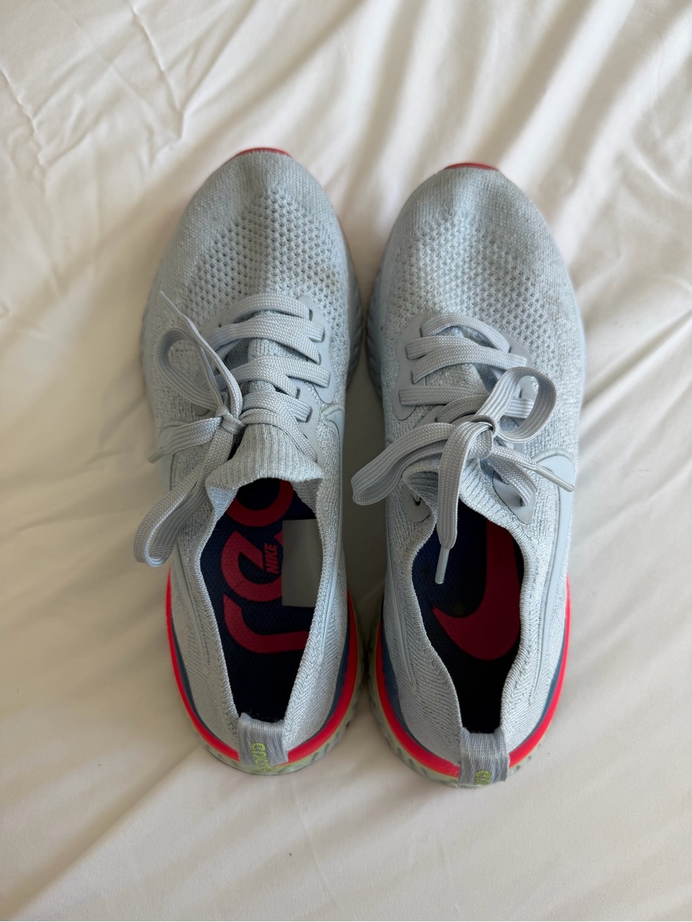 Nike Women’s Blue and Pink Flyknit Running Shoes